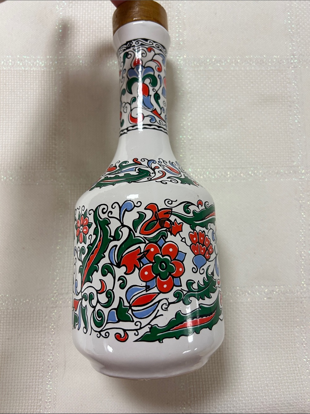 a vintage handmade porcelain Metaxa decanter from Greece